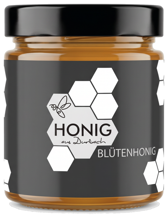 Blütenhonig im Glas mit schwarzem Deckel